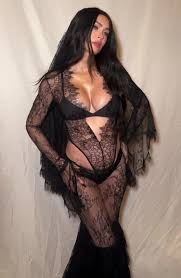 Megan Fox Stuns as a Gothic Bride in Black Lace Lingerie for New Maternity Shoot